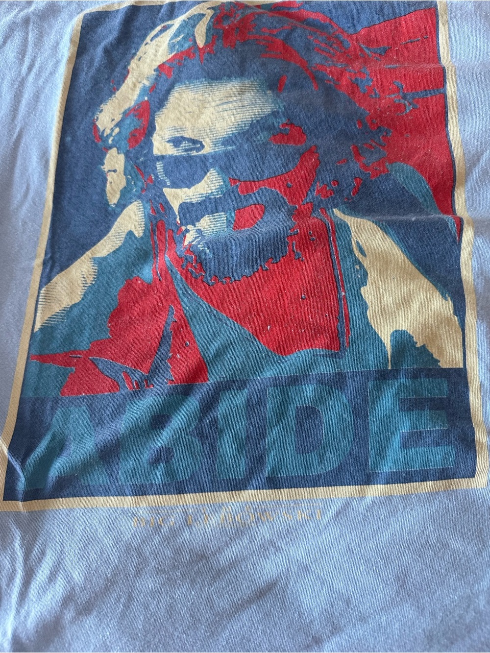 Light Blue Short Sleeve Graphic Tee with Red and Cream Artwork